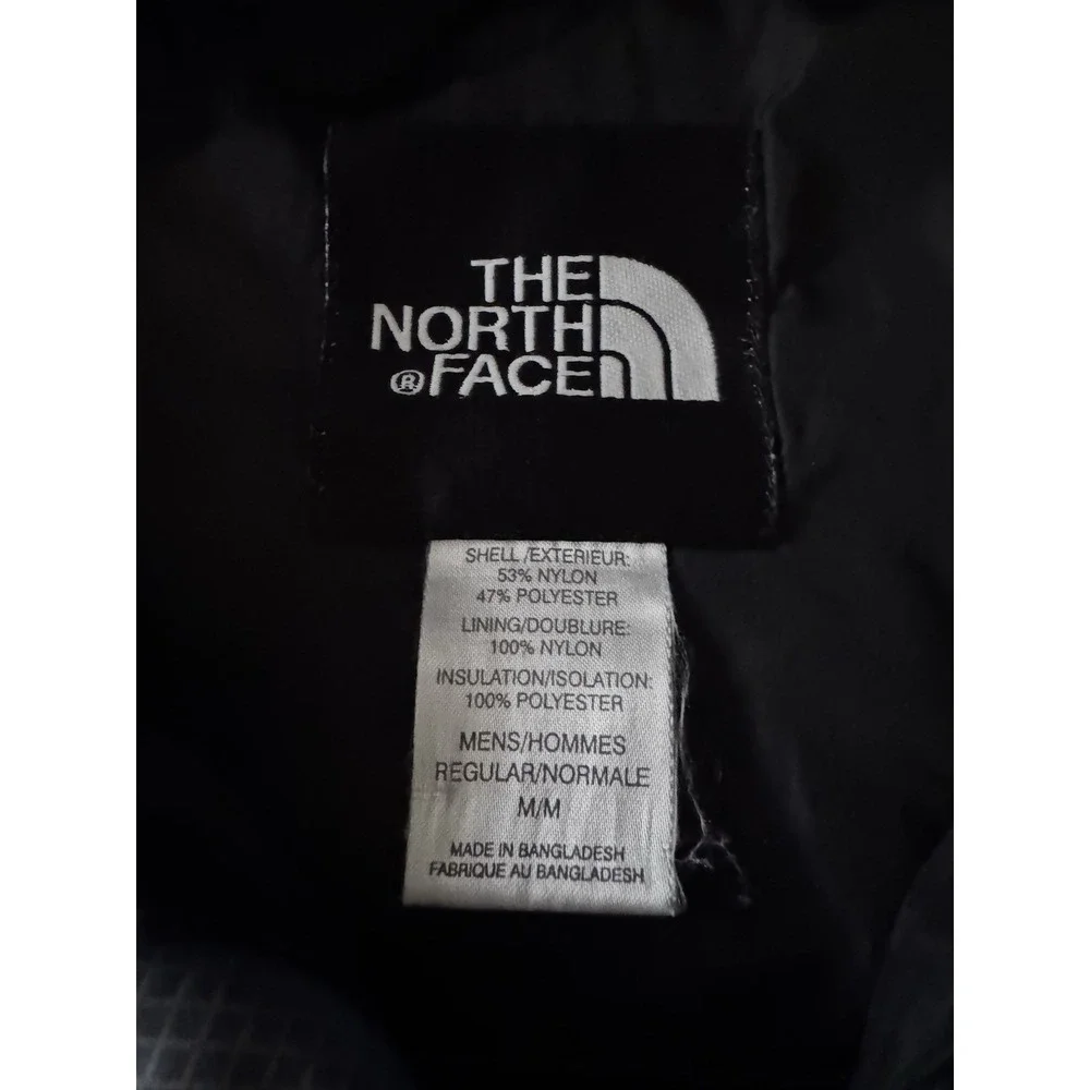 The North Face Mens Medium Blue Plaid Jacket With Built In Stow Away Bag Pocket